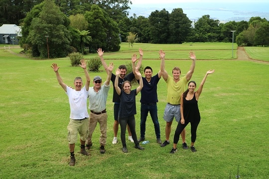 corporate team at working bee triple care farm