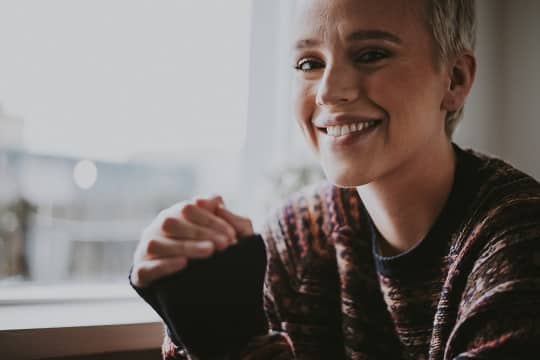 young person smiling
